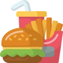 A burger served with crispy fries and a refreshing beverage.