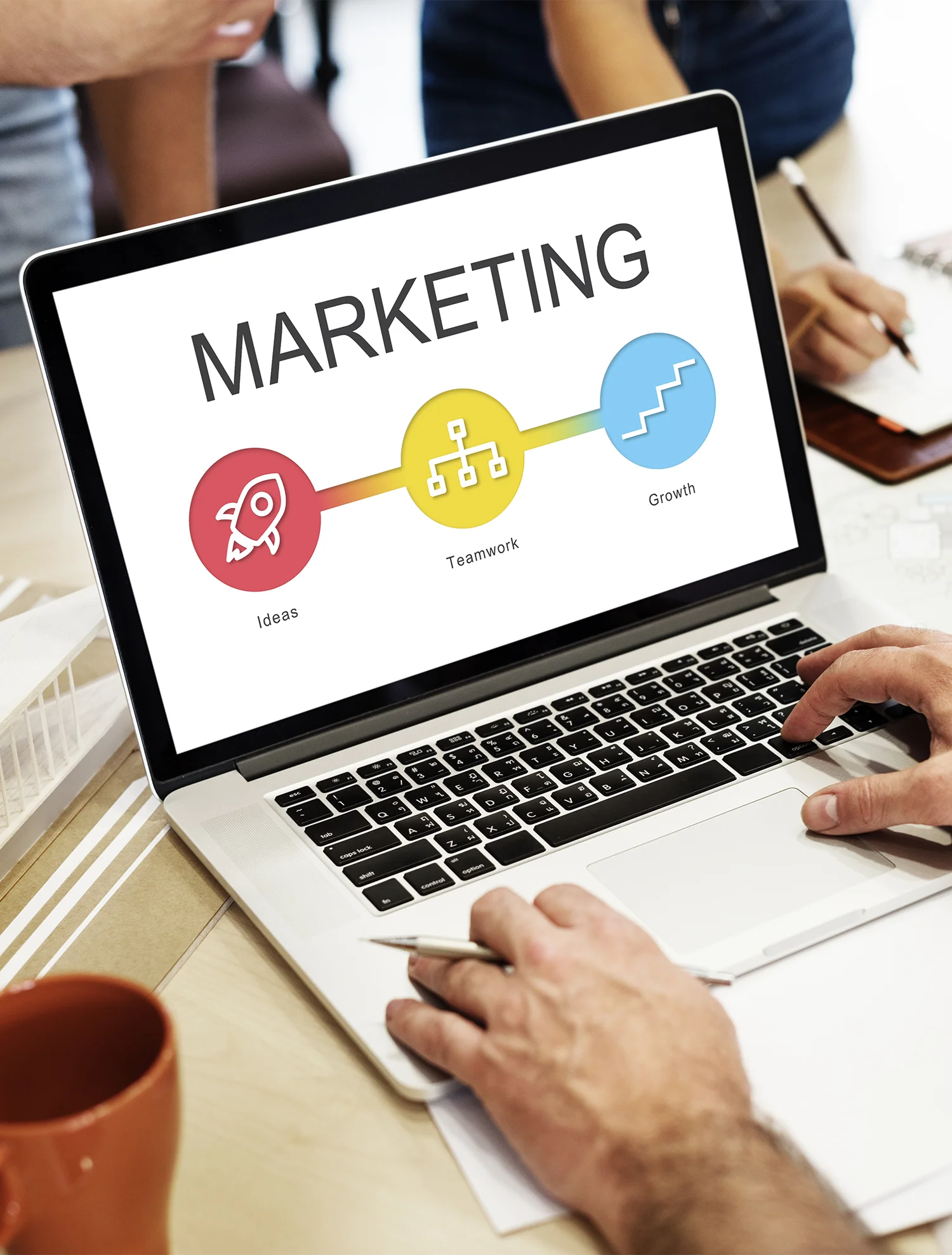Image illustrated Marketing concepts on a laptop screen showcasing ideas, teamwork, and growth