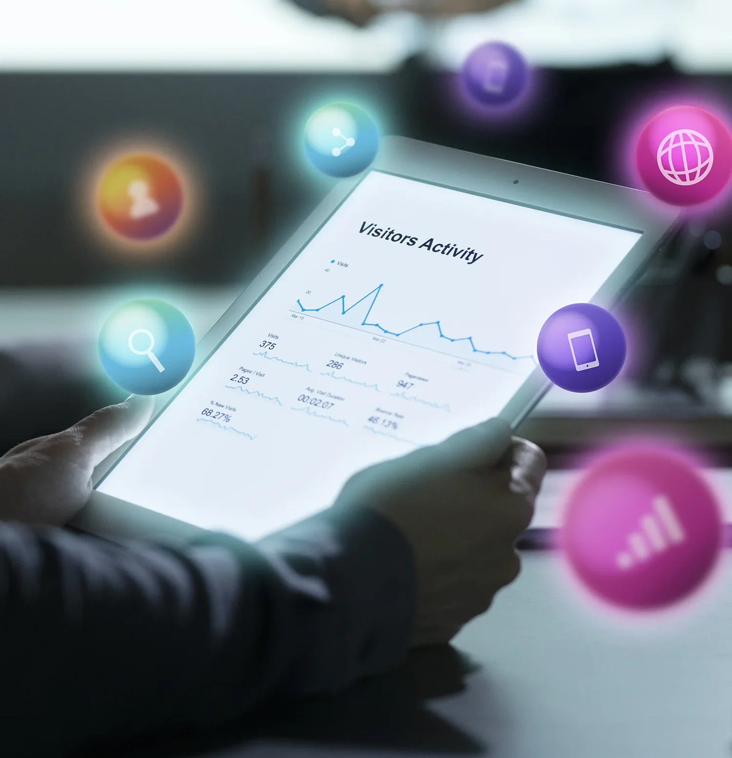 Analysis of social media marketing metrics on a tablet with data graphs.